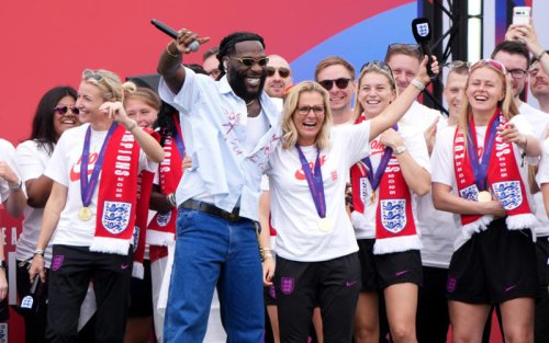 Sarina Wiegman steals show at Lionesses parade with Burna Boy love-in