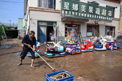 Heavy rain leaves dozens dead in Beijing, state media reports