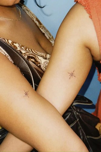 How the tiny tattoo became a big status symbol