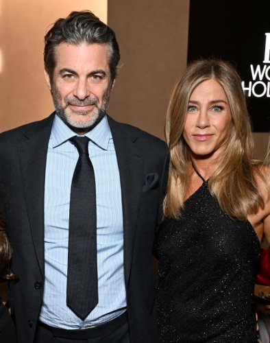 Jennifer Aniston Wows in a Glittery Halter Dress for Her Red-Carpet Debut With Jim Curtis