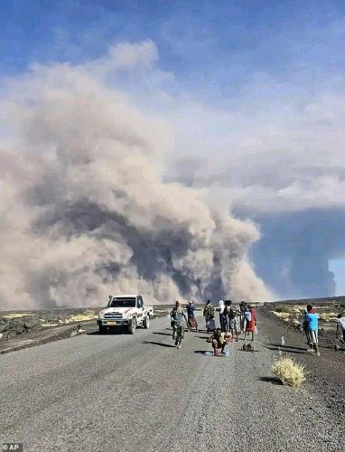Travel chaos and flights cancelled after volcano eruption spreads ash across two continents