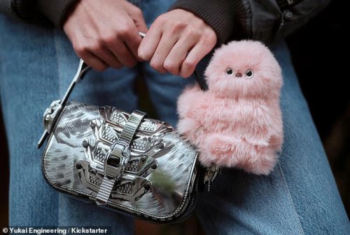 The next Labubu? Fluffy robot 'Mirumi' clings to your bag - and even moves its head when you pet it