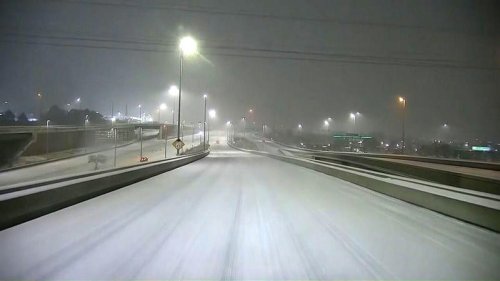 Plane skids off icy runway as snow snarls post-Thanksgiving travel