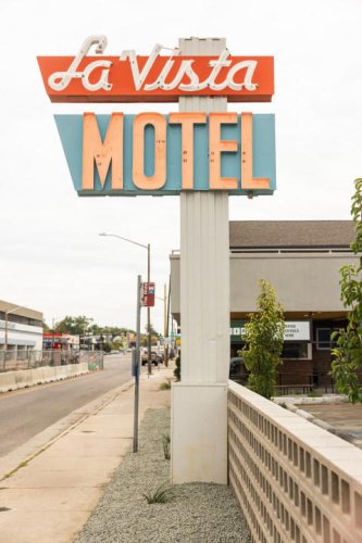 Historic shuttered Denver motel reopens, restored to 1956 vintage look