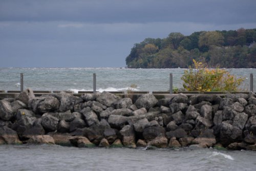 Where is Lake Ontario located?, How deep is Lake Ontario?, How wide is Lake Ontario? How long?, How warm does Lake Ontario get?, Does it get warm enough to swim in Lake Ontario?, How many lighthouses are on Lake Ontario?, How many shipwrecks are there in Lake Ontario?, What is Niagara Falls?, What is the Welland Canal?, What is the lake's Indigenous name?, This Great Lake doesn't border Michigan. 10 facts about Lake Ontario