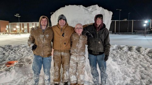 Students build giant minion out of snow on Vincennes University campus