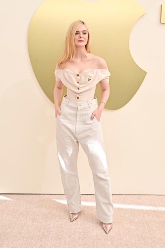 Elle Fanning manages to make a corset look absolutely effortless