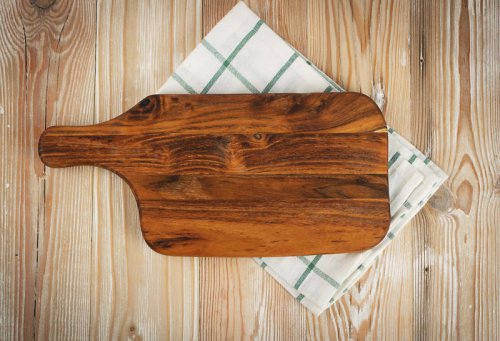 Use a damp napkin or towel to keep your cutting board in place., When making something like risotto, add cold butter at the end., Don't overmix your batters., Let meat and fish rest at room temperature before cooking., I'm a chef with over 15 years of experience. Here are 12 tips I learned in culinary school that at-home cooks should know
