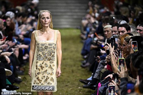 Gillian Anderson, 57, rules the runway as she walks in the Miu Miu Paris Fashion Week catwalk show