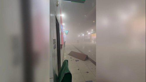 Passengers flee smoke-filled Dubai airport as Iran attacks major Gulf travel hubs