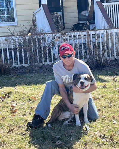 Man rescues elderly woman from house fire &mdash; then his dog saves her dog