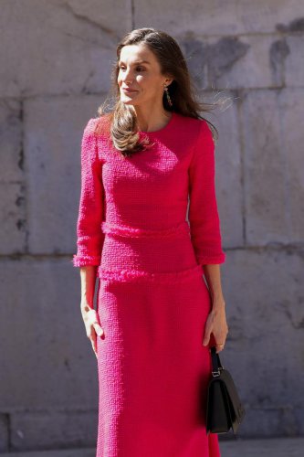 Queen Letizia rewears a hot-pink tweed midi dress just in time for spring