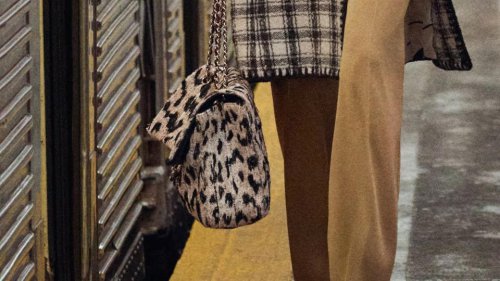 Look of the week: Harry Styles proves that 'it-bags' are for the boys, too