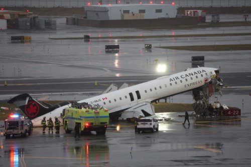 Photos show Air Canada crash wreckage at LaGuardia airport