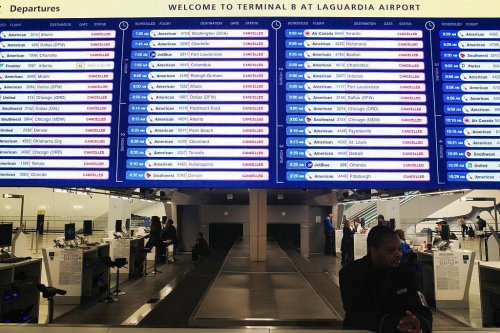 LaGuardia closed until 2 p.m. Monday as plane crash investigation continues
