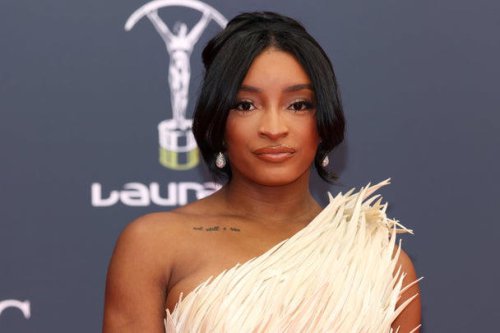 In an Instagram stories post shared Saturday, the 7-time Olympic gold medalist posted a picture of herself wearing hospital bracelets before opening up about the frightening ordeal., She wrote, "I'm not one to normally share things like this because I value privacy in today's age. but almost dying wasn't on my bingo card earlier this week.", While Biles stopped short of revealing the exact cause of the medical emergency, she described it as the "scariest experience.", "especially since Jonathan was in Indy for practices," she wrote of her husband, Indianapolis Colts player Jonathan Owens., Biles, 29, said she's now recovering and thanked friends and loved ones for their support. "s/o to my close circle who reached out, checked in, visited & or sent flowers," she added. "loooovveeee y'all.", Biles also shared pictures of several floral arrangements she received., Followed by a picture of her resting in bed with her two French bulldogs, Lilo and Rambo. In the post, she included an image showing an elevated heart rate of 126 beats per minute and wrote, "i'll be here.", Celebrity Updates, Simone Biles says she was hospitalized after the 'scariest experience of her life'