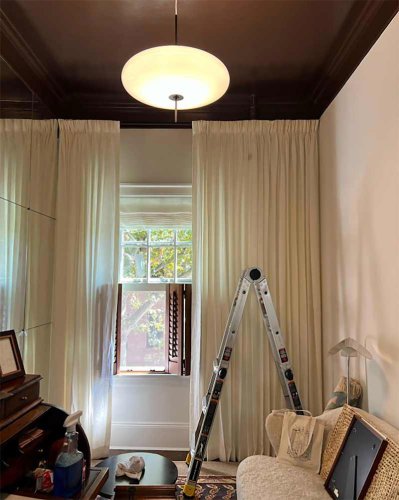 A designer transformed this narrow room into a Venetian-inspired study (it looks so much bigger now!)