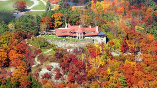 Hidden in New Hampshire's lake region is a scenic mountaintop mansion with trails and waterfalls