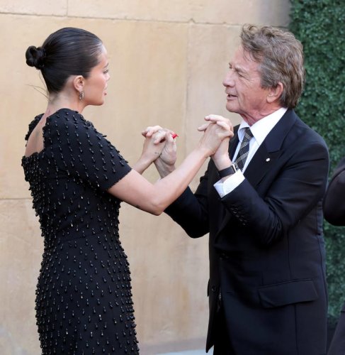 Selena Gomez steps out in diamond feather earrings to support Martin Short