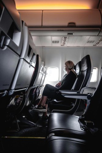 Woman refuses to go on boyfriend's family vacation after discovering she's the only one without a business class ticket to the trip