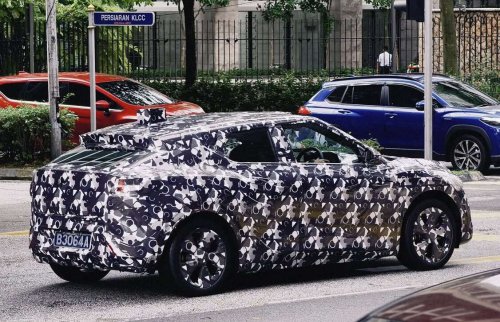 Perodua &lsquo;QV-E&rsquo; EV spotted without rear wing, exposing sloping roofline, notched tailgate design, sporty profile