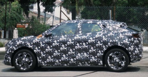 Perodua &lsquo;QV-E&rsquo; EV spied again in Malaysia &ndash; sloping roofline, small side window revealed; debut in Q4 2025