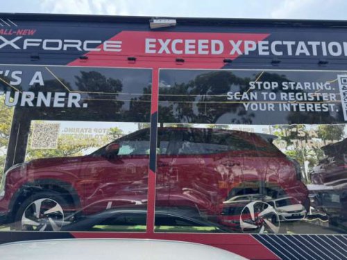 Mitsubishi Xforce spotted again in Malaysia on the back of a roving truck &ndash; nationwide tour until March 15